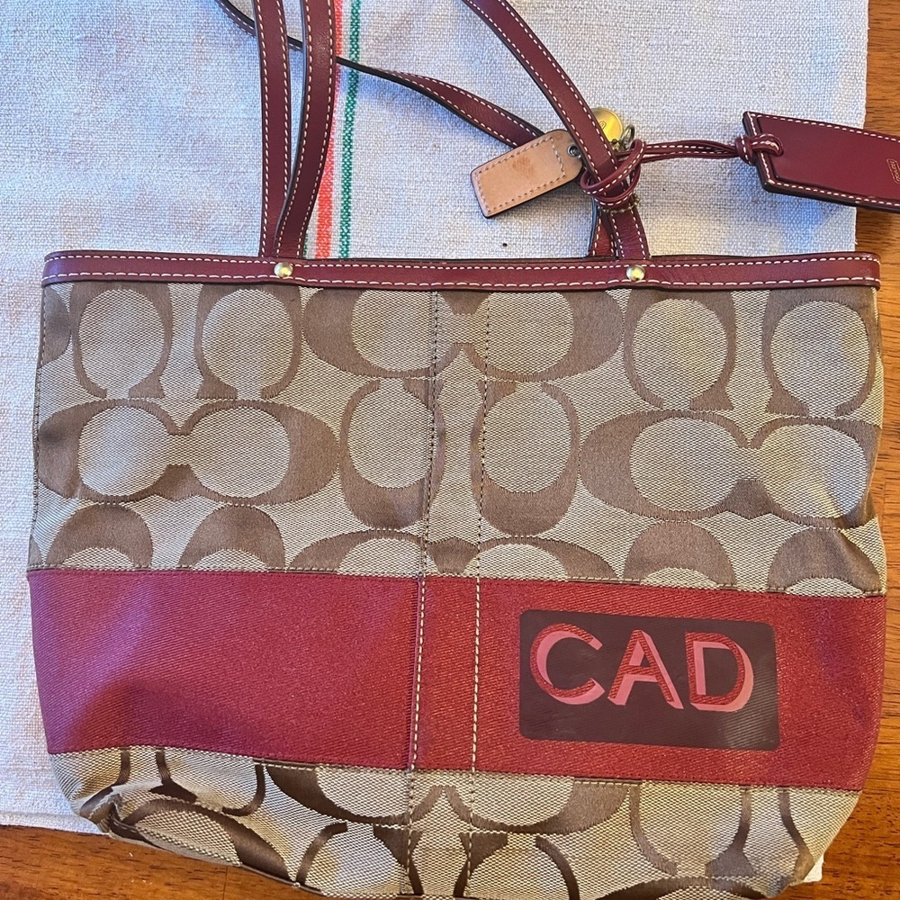 Coach Brown and Burgundy Signature Tote​​